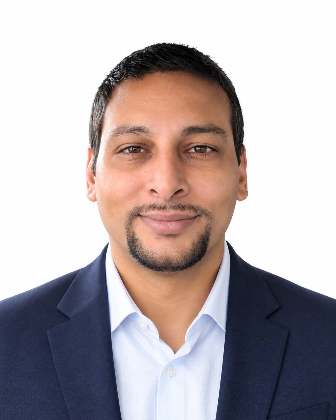 Professional head-and-shoulders portrait of Wanderveil Travel founder Tim Selliah on a white background.